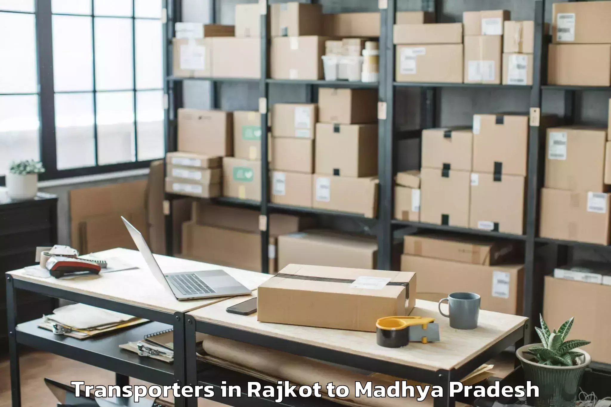 Top Rajkot to Mauganj Transporters Available